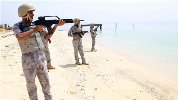 Members of Saudi border guard pose for pictures in the Ashiq island, in the southern Jizan Province near the border with Yemen on April 1, 2015. (AFP/File)