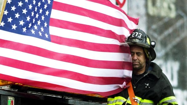 A firefighter at 'Ground Zero', three days after the attack. (AFP / Tannen Maury)
