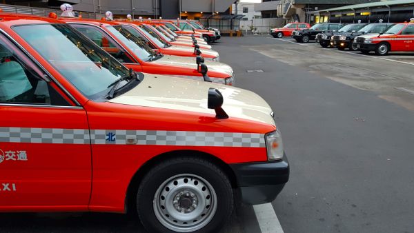 Many metropolis orange taxi cars. (Shutterstock/ File Photo)