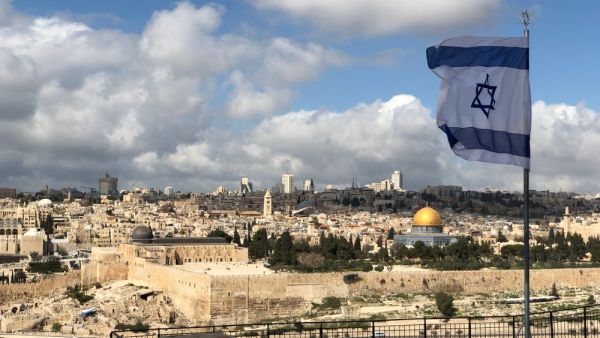 Israel flag above the old city of Jerusalem Israel (Shutterstock/File Photo)
