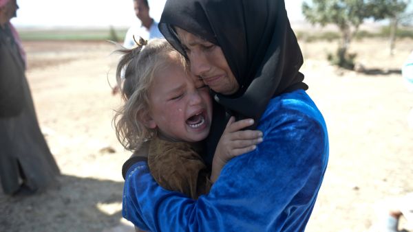 Syrian refugees (Shutterstock)