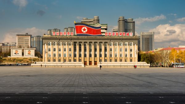 Kim Il-sung Square and government building decorated with national flag of Democratic People's Republic of Korea in central Pyongyang.(Shutterstock/ File Photo)