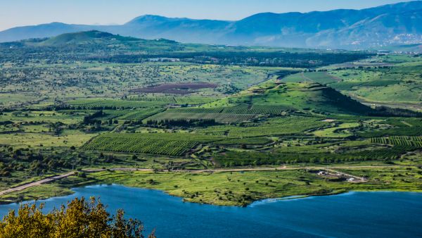 Lake and conic hill at Golan Heights (Shutterstock)