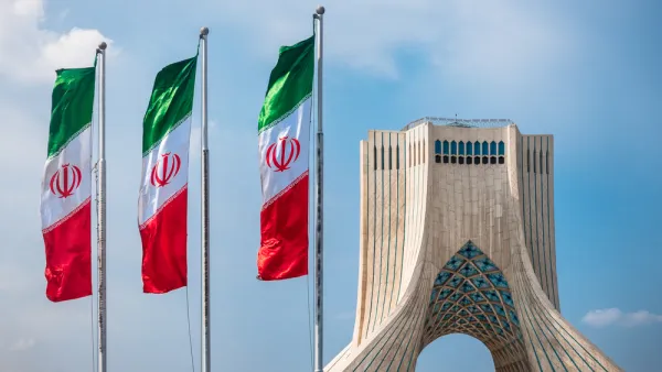 Tehran's Azadi Tower with Iranian flags, (Shutterstock/File Photo)