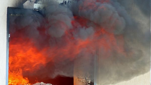 Smoke quickly engulfed the house which prevented the mother as well as neighbors from rescuing the children (Shutterstock/File)