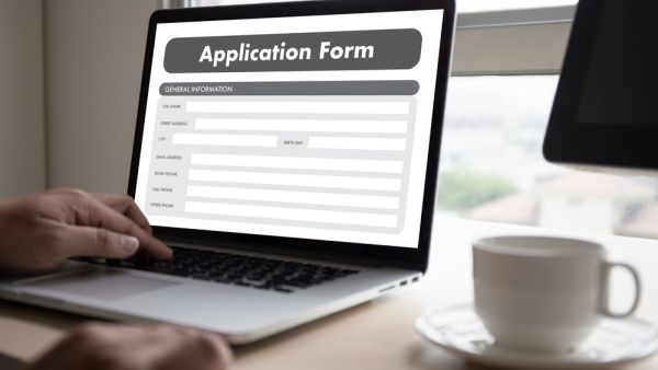 Man applying for a job online. (Shutterstock/ File Photo)