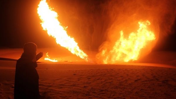 Flames rise from a pipeline in Egypt that delivers gas to Israel and Jordan after an attack by militants. (AFP/ File)