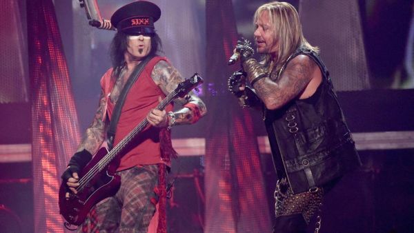 Bassist Nikki Sixx and singer Vince Neil of Motley Crue perform onstage. (AFP/File)
