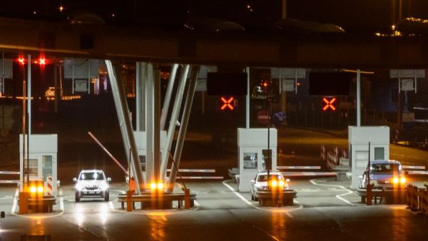 Cars pass through the Obrezje border crossing point on border between Slovenia and Croatia on March 9, 2016 in Obrezje, Slovenia. (AFP/Jure Makovec)