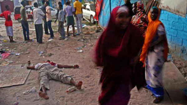'You probably think that after years of photographing death and destruction, the attacks would stop affecting me. But it’s not true,' AFP photojournalist Mohamed Abdiwahab reflects on covering Mogadishu.  (AFP/Mohamed Abdiwahab)
