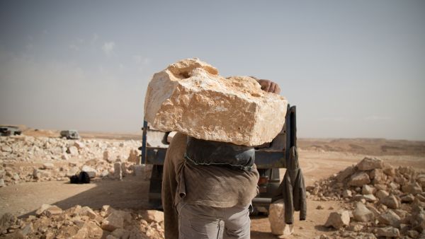 The profession of “stone mover”, first began in the seventies, involves the moving, by hand, of medium-sized stones from the quarries to trucks, prior to their transport to stone crushing plants where they are broken down for sale. (http://www.hussamd.me/)

