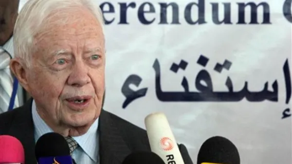 الرئيس الاميركي الاسبق جيمي كارتر يتحدث في مؤتمر صحفي في الخرطوم عن اجراءات الرقابة على الاستفتاء/أ.ف.ب