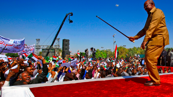 Sudanese President Omar Al Bashir Dances for his supporters in Khartoum. (AFP)
