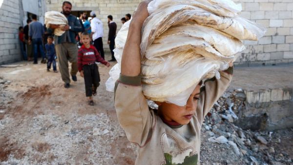 No matter where you live in Syria, bread is no guarantee. But your province could mean a world of difference in price. (AFP/File)
