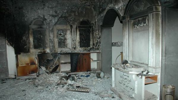 A picture taken on May 9, 2014 shows the damage inside Um al-Zinar church in the Christian Hamidiyah neighborhood of Syria's central city of Homs. (AFP/File)