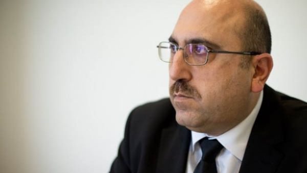 Observatory Director Rami Abdul-Rahman's face was photoshopped on one of Daesh's execution victims. (AFP/File)