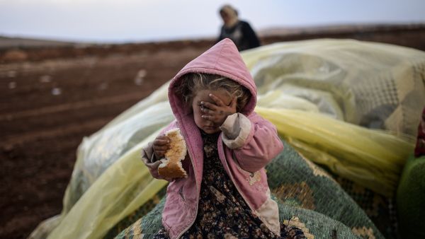 "All they want is taking pictures," says a Jordanian man of the many aid organizations in his country trying to help Syrian refugees.  Aid workers, often foreign and unaware of local customs, tend to bring with them an unbalanced power dynamic when working with refugees, writes Ann-Christin Wagner.  (AFP/Bulent Kilic)