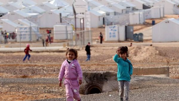 Young Syrian refugees stand at the Azraq refugee camp in northern Jordan. (AFP/File)