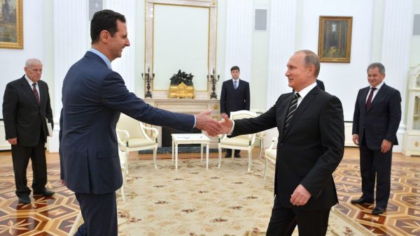 الرئيس السوري بشار الأسد مع نظيره الروسي فلاديمير بوتين في الكرملين