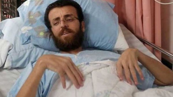 إسرائيل تفرج عن الصحافي الفلسطيني محمد القيق