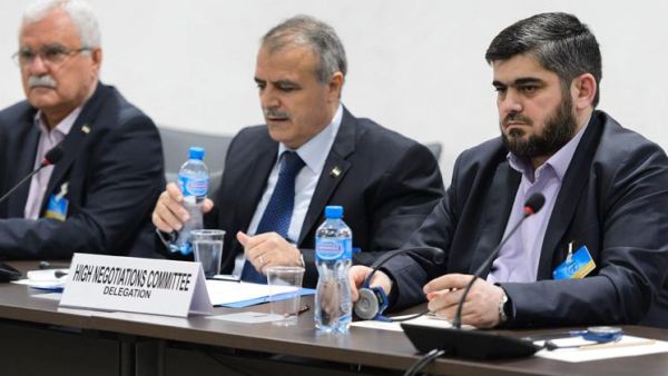 المعارضة تلوح بتعليق مشاركتها في مفاوضات جنيف
