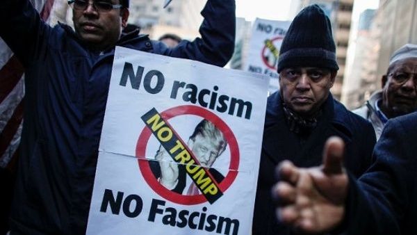 Demonstrate against the rise in racism, Islamophobia and anti-Semitism and in support of refugee and migrant rights (AFP/File Photo)