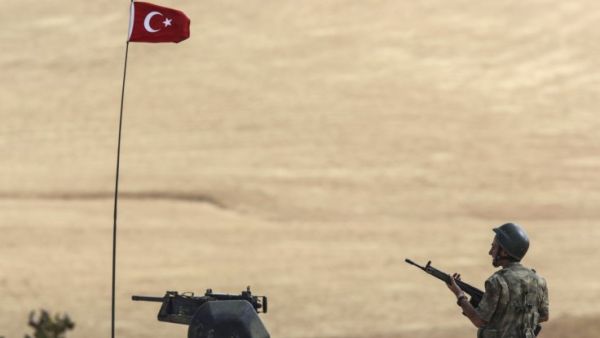 A Turkish soldier patrols the increasingly volatile Turkish-Syrian border. (AFP/Bulent Kilic)
