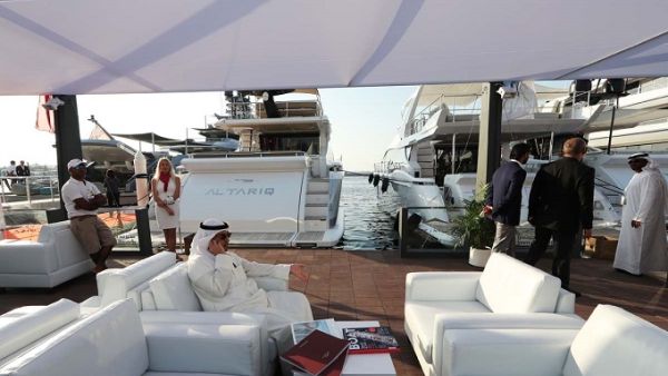 Visitors check boats docked at the Dubai International Marine Club during the Gulf emirate's international Boat Show on February 28, 2017. (Karim Sahib/ AFP)