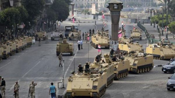 Sisi is considered responsible for directing the overthrow of former Egyptian President Morsi that has left the country in turmoil and chaos since the president's exit in July (Courtesy of Voice of America)