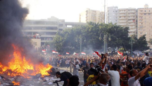 Morsi supporters clashed with Egyptian security forces throughout the country Friday leaving at least four killed in the violent exchanges (Courtesy of STR/AFP/Getty Images) Morsi supporters clashed with Egyptian security forces throughout the country Friday leaving at least four killed in the violent exchanges (Courtesy of STR/AFP/Getty Images)