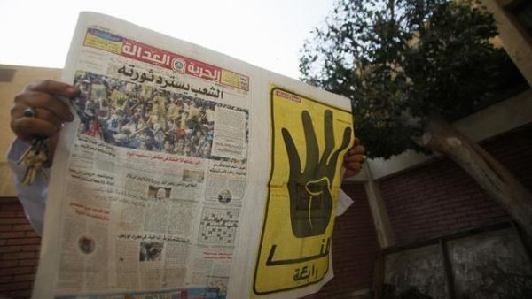 The Muslim Brotherhood's Freedom and Justice newspaper headquarters was raided Wednesday despite government statements that the ban on Muslim Brotherhood activities may be delayed (Courtesy of Euro News)