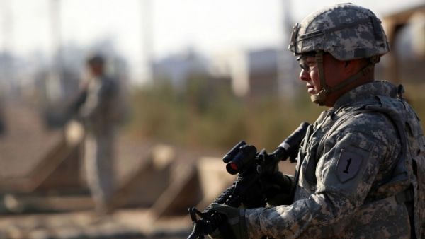 A US soldier stands guard at an American military base in Iraq. (AFP/File)