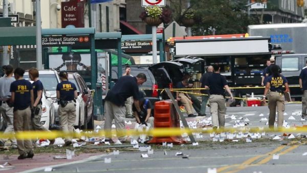 Law Enforcement Officers are seen at the scene of an explosion on West 23rd Street September, 18, 2016 in New York. (AFP/Kea Betancur)