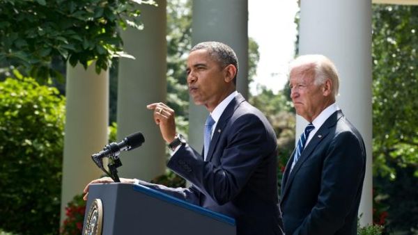 UNITED STATES, Washington : US President Barack Obama, with US Vice President Joe Biden, speaks on Syria in the Rose Garden at the White House in Washington on August 31, 2013. AFP PHOTO/Nicholas KAMM