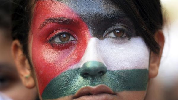 A woman takes part in a demonstration in France against Israel's summer 2014 military campaign in Gaza.  (AFP/Boris Horvat)