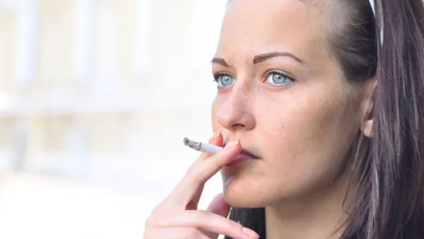 التدخين يساعد على تقليل والمحافظة على رشاقة الجسم
