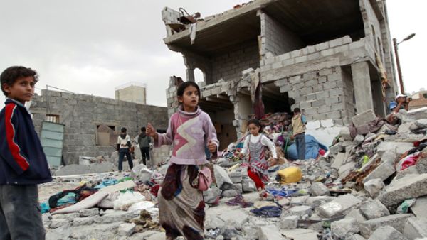 Children walk through the rubble after an airstrike in Yemen. (AFP/File) Children walk through the rubble after an airstrike in Yemen. (AFP/File)