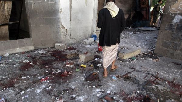 Houthi rebels check the Balili Mosque in the capital Sanaa, following an explosion on Sept. 24, 2015 on the first day of Eid al-Adha. (AFP/Mohammed Huwais)