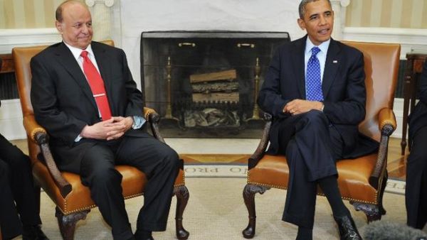 UNITED STATES, Washington : US President Barack Obama and Yemen's President Abdrabuh Mansur (L) are seated as they wait for the press to arrive before they speak in the Oval Office of the White House on August 1, 2013 in Washington, DC.  AFP PHOTO/Mandel NGAN