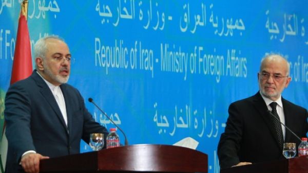 وزير الخارجية الايراني محمد جواد ظريف في مؤتمر صحافي مشترك مع نظيره العراقي ابراهيم الجعفري