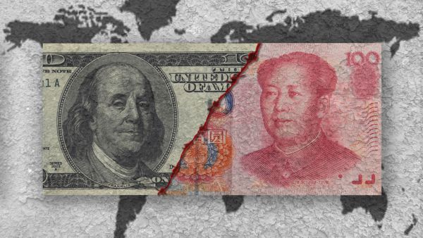 US dollar hits 10-month high as Chinese yuan slides