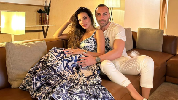 Nadine Njeim on her fiancé's back in a bikini
