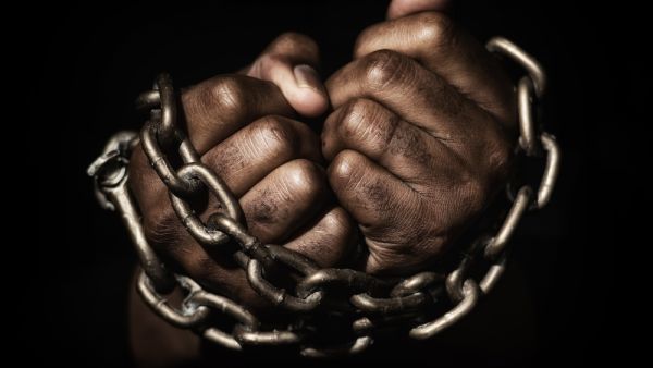 America's first black billionaire says taxpayers need to 'pay out of their paychecks' and fund $14 TRILLION in reparations for descendants of slaves if they really want to make atonement - and he wants a check, too