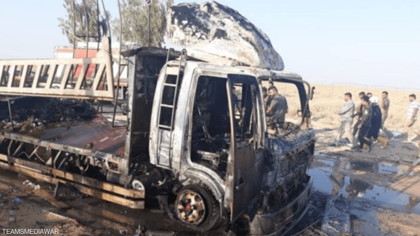 صورة وزعها اعلام الحشد العشبي في العراق لالية مدمرة في مكان قرب الحدود مع سوريا 