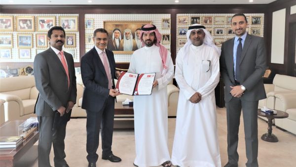 Ahmed Fawzi Kanoo, Director at YBA Kanoo Group in center with YBA Kanoo’s IT team