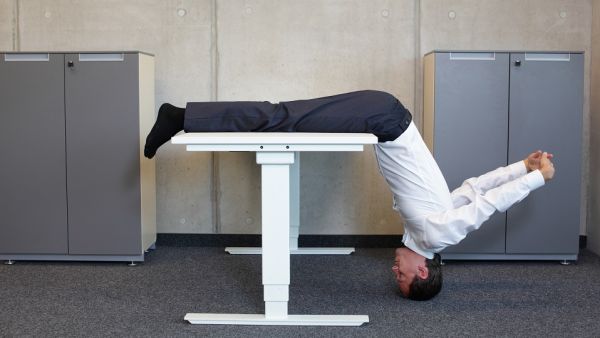 A quick stretching and exercise routine at your desk might improve your strength and concentration and keep you healthy.