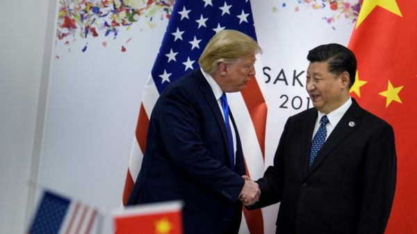 China's President Xi Jinping (R) greets US President Donald Trump before a bilateral meeting on the sidelines of the G20 Summit in Osaka on June 29, 2019.  Brendan Smialowski / AFP