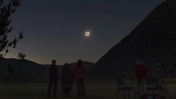 People watch the total solar eclipse from El Molle, Chile, on July 2, 2019. Tens of thousands of tourists braced Tuesday for a rare total solar eclipse that was expected to turn day into night along a large swath of Latin America's southern cone, including much of Chile and Argentina. Stan HONDA / AFP