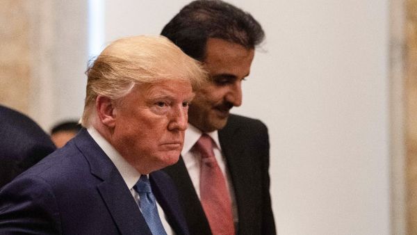 US President Donald Trump and Sheikh Tamim bin Hamad al-Thani, Emir of Quatar, take their seats at a dinner at the Treasury Department in Washington, DC, on July 8, 2019.  NICHOLAS KAMM / AFP