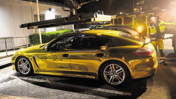 Motorist fined for driving shiny, gold Porsche (Twitter)
